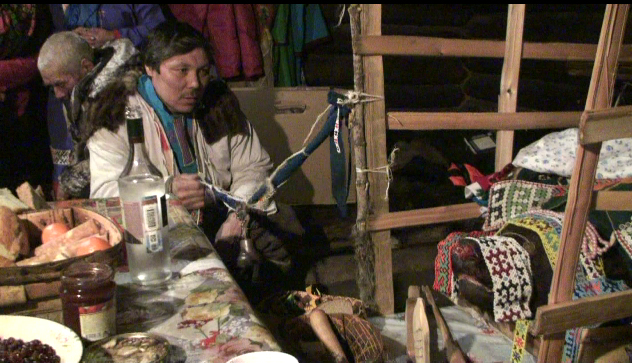 Figure 2. Apprentice Yegor Kinyamin singing at Kinyamino Bear Festival, M. Yugan River, Siberia, March 2016. Photo courtesy of Andrew Wiget.