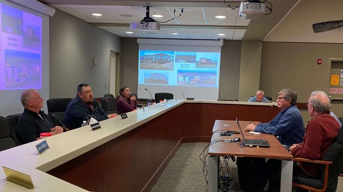 Figure 6. Symposium co-chairs Billy Connor and Vladimir Romanovsky of UAF address the NSB mayor and borough assembly during a public workshop on 1 August 2023, the final day of the Symposium in Utqiaġvik. Photo courtesy of Jana Peirce.